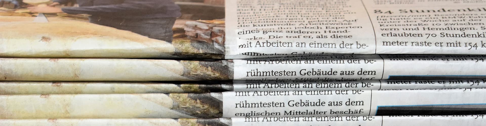 Zeitungsstapel als Symbolbild für  Aktuelles.